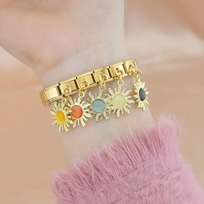 Golden Sun with Sky Blue Resin Gem - Gold Pendant Charm